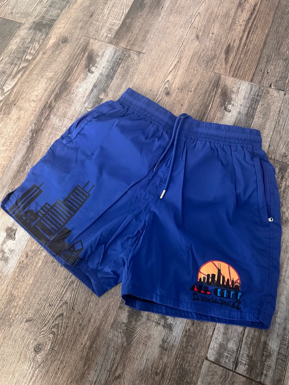Just Don Blue Swim Trunks with Orange ALLCITY Patch